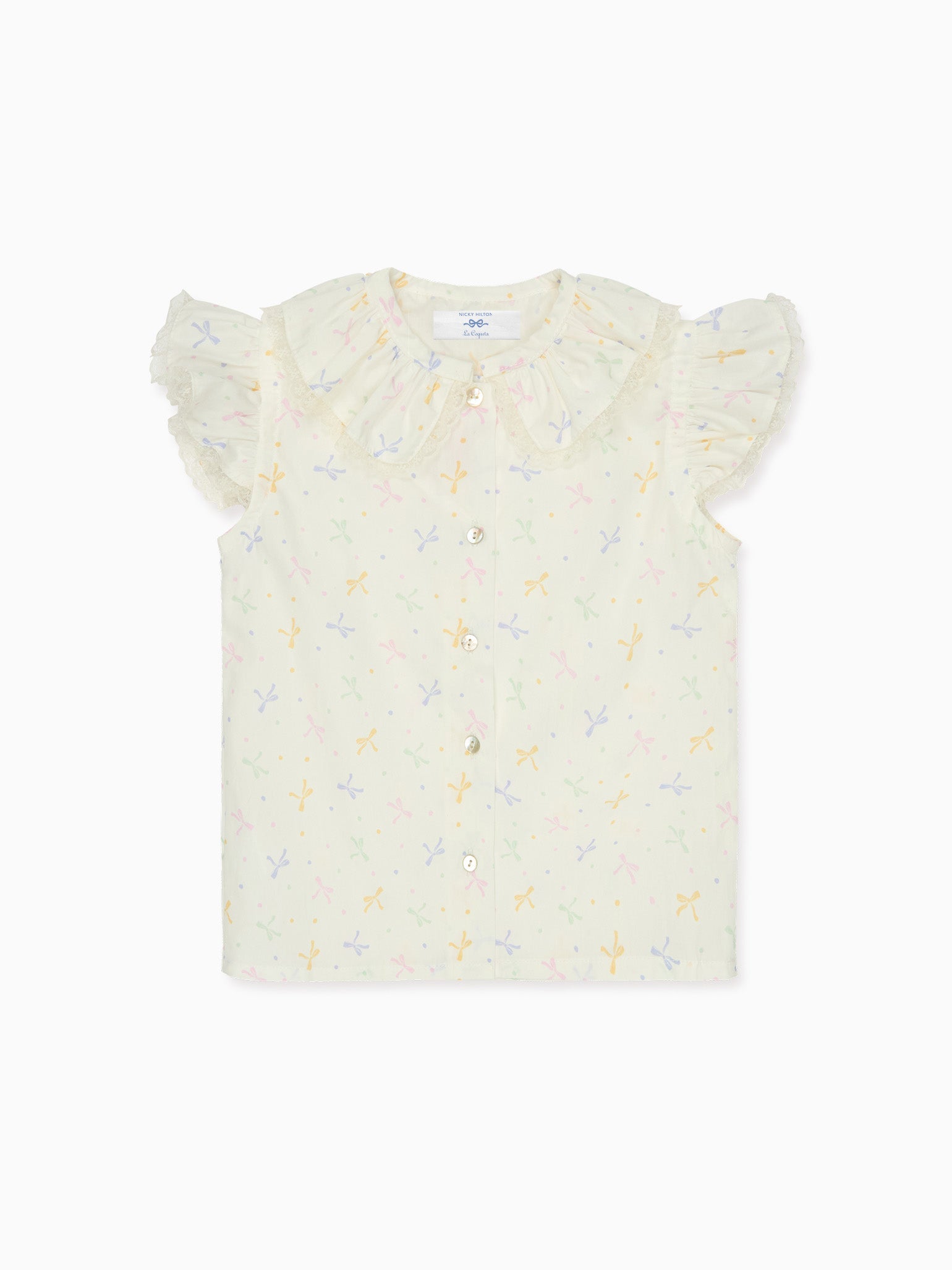 Nicky Hilton x La Coqueta Ivory Bow Olivia Girl Shirt